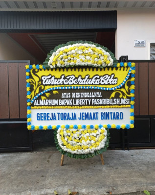 Papan Bunga Duka di Mamboro